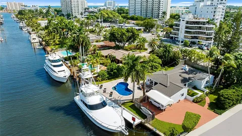 a view of a chairs and table in a patio