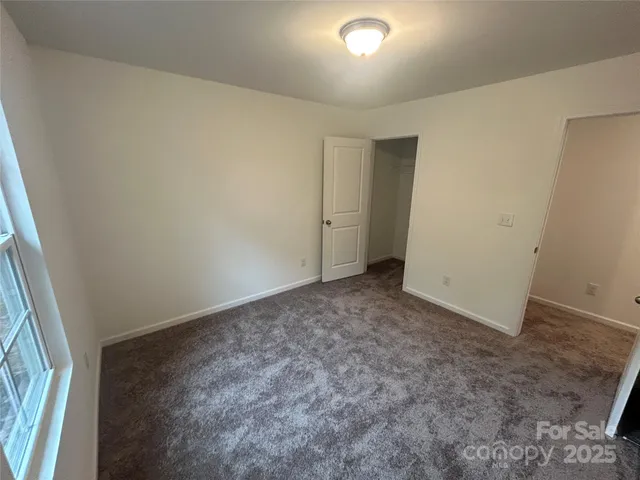 an empty room with a natural light