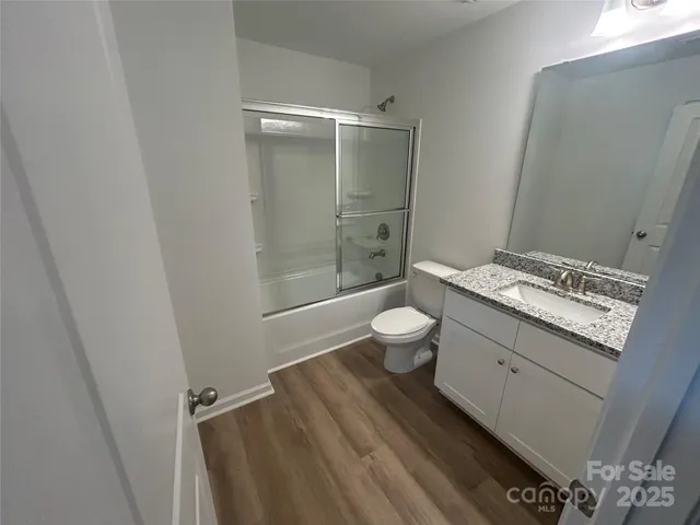 a view of storage and utility room with racks on the wall
