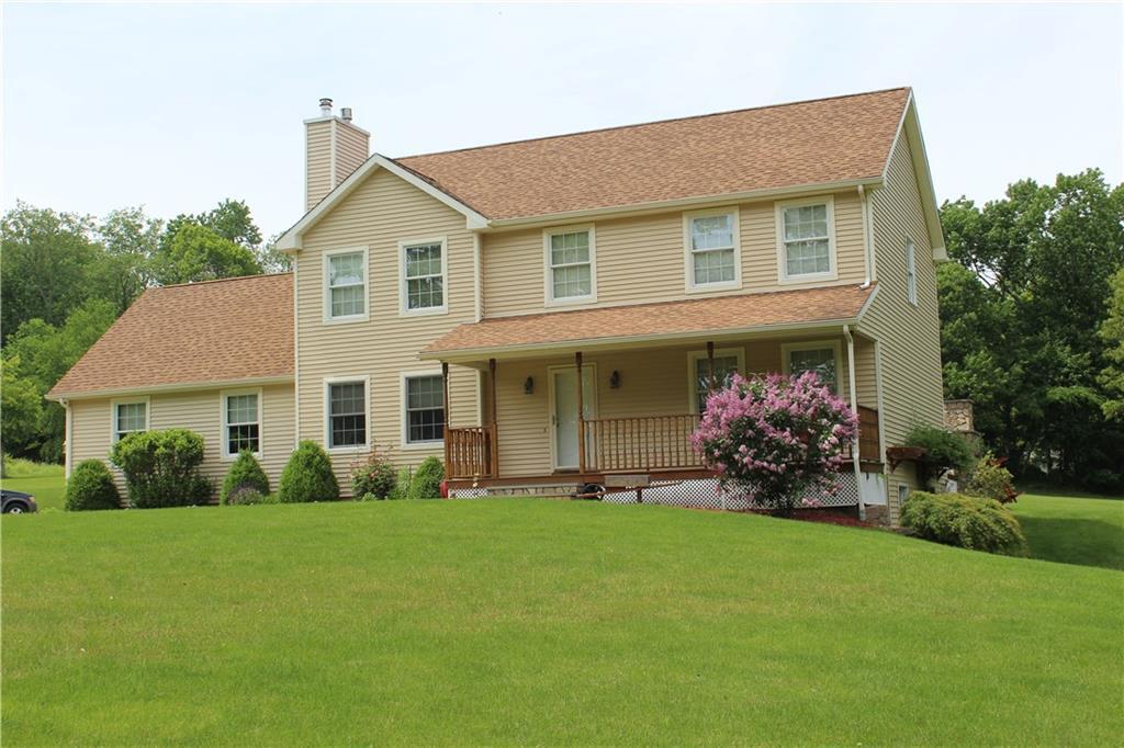 1344 Exeter Road Lebanon, CT 06249 - Photo 1 of 1 a front view of a house with a porch
