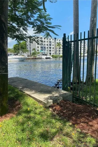 a view of a backyard of the house