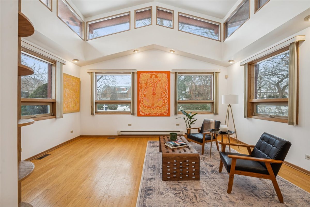 744 Sheridan Road Evanston, IL 60202 - Photo 26 of 44 a living room with furniture and large windows