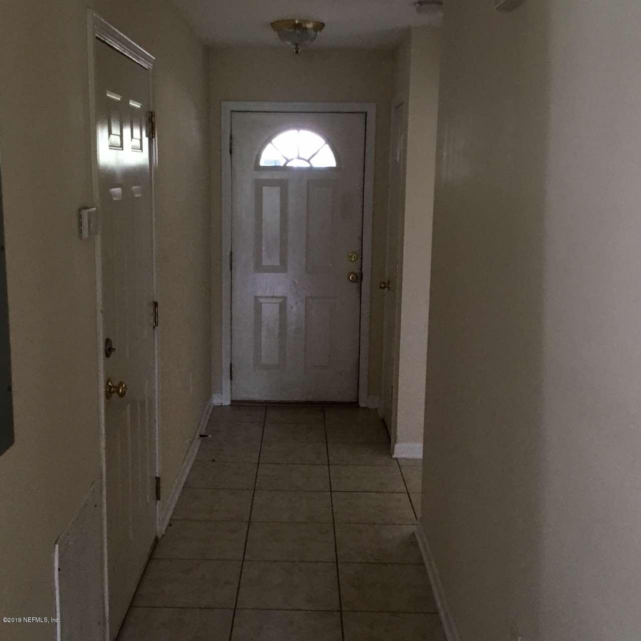 2170 Brooklyn Road Jacksonville, FL 32209 - Photo 8 of 10 a view of a hallway with windows