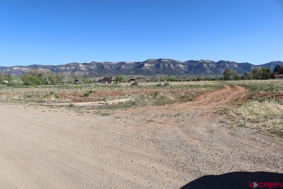 530 Juniper Place Cortez, CO 81321 - Photo 3 of 3 a view of lake with mountain view