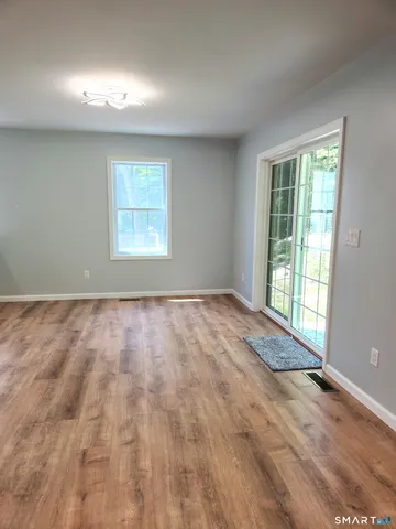 a view of an empty room and window