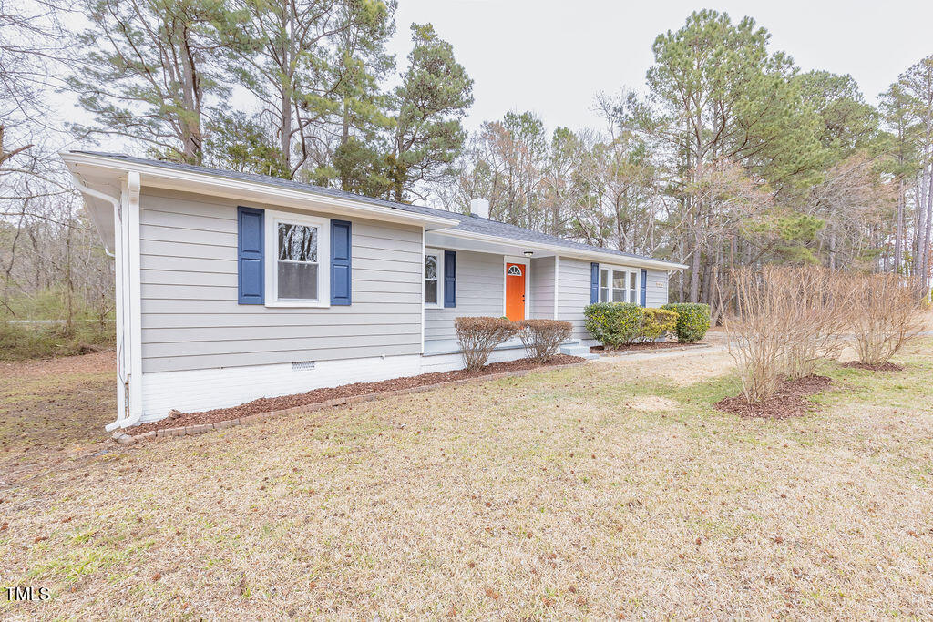 4814 Fayetteville Road Durham, NC 27713 - Photo 31 of 32 a view of a house with a yard and tree s
