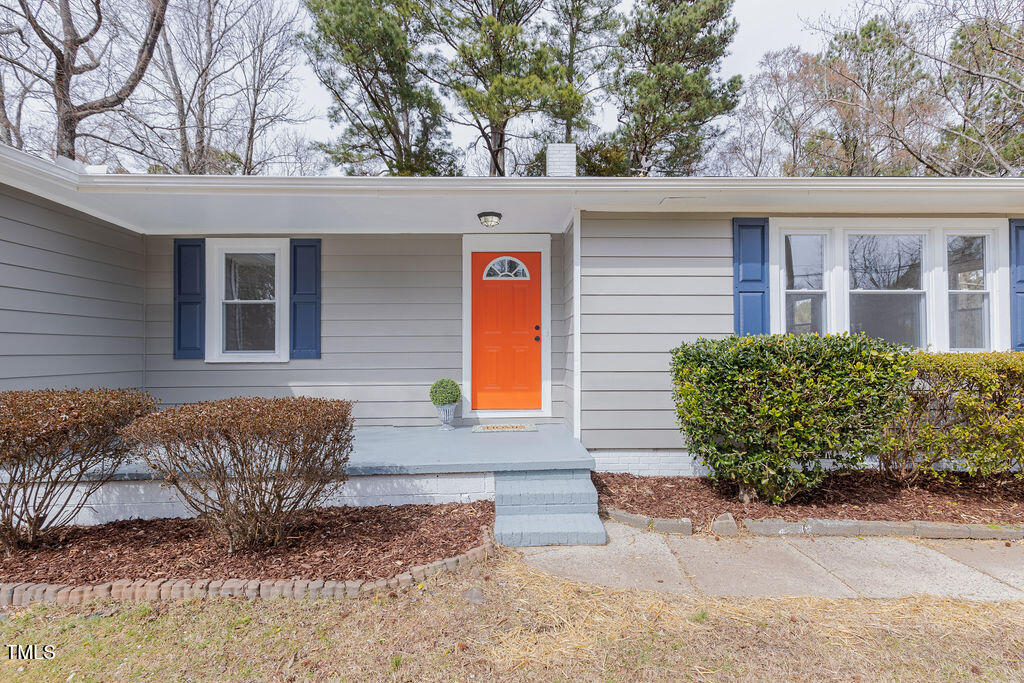 4814 Fayetteville Road Durham, NC 27713 - Photo 4 of 32 a front view of a house with garden