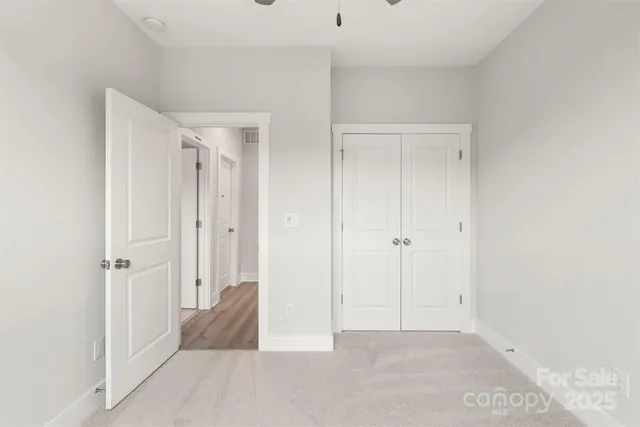 a view of a bathroom with a glass door