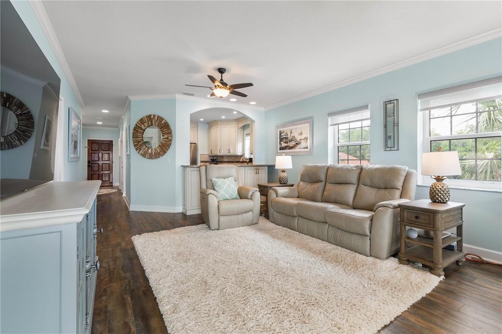 102 Rivers Edge Lane, Unit 102 Palm Coast, FL 32137 - Photo 12 of 67 a living room with furniture and a window