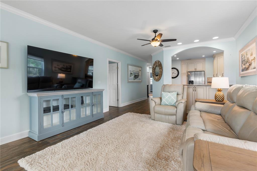 102 Rivers Edge Lane, Unit 102 Palm Coast, FL 32137 - Photo 14 of 67 a living room with furniture and a flat screen tv