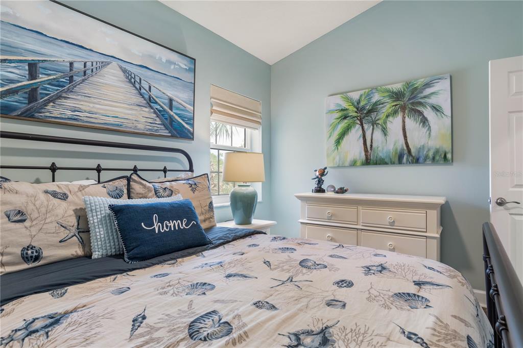 102 Rivers Edge Lane, Unit 102 Palm Coast, FL 32137 - Photo 32 of 67 a bedroom with a bed and a window