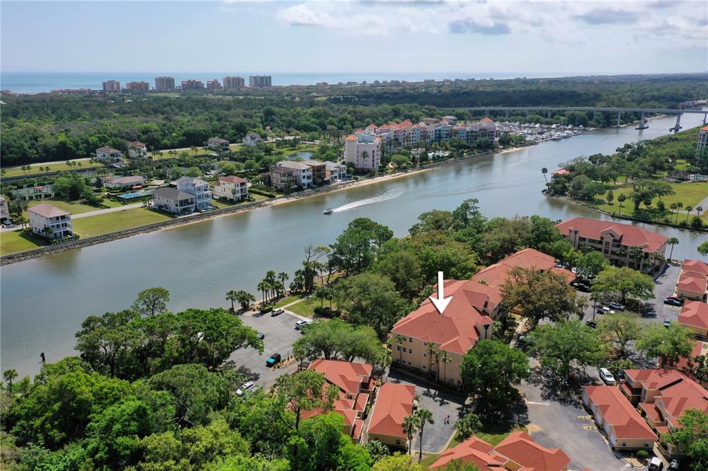 102 Rivers Edge Lane, Unit 102 Palm Coast, FL 32137 - Photo 42 of 67 an aerial view of a city with lake view