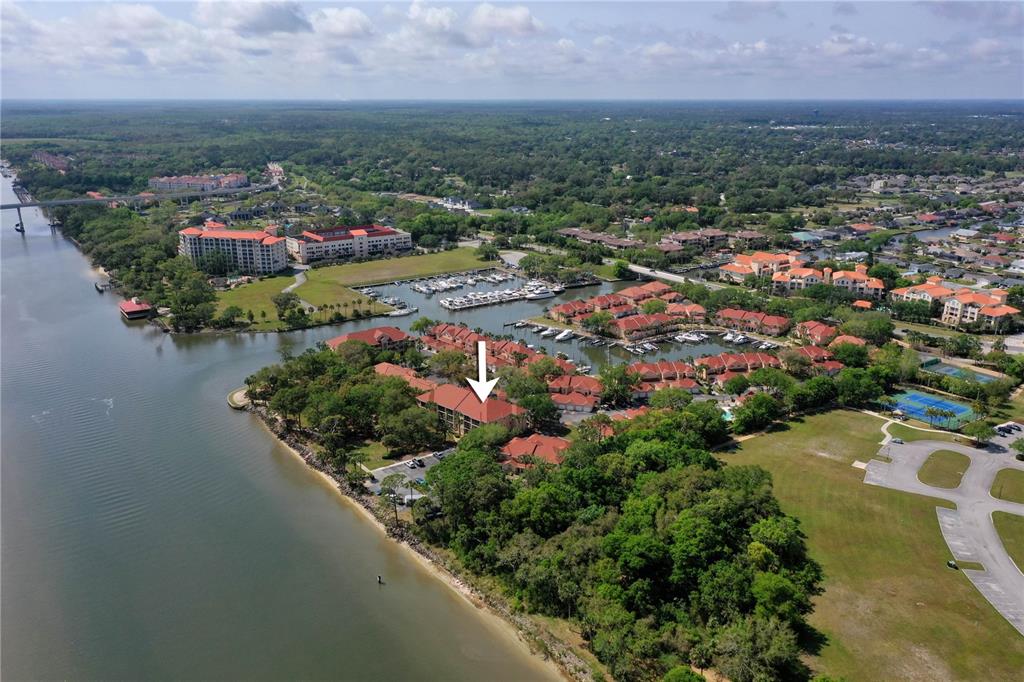 102 Rivers Edge Lane, Unit 102 Palm Coast, FL 32137 - Photo 46 of 67 an aerial view of a city with lots of residential buildings