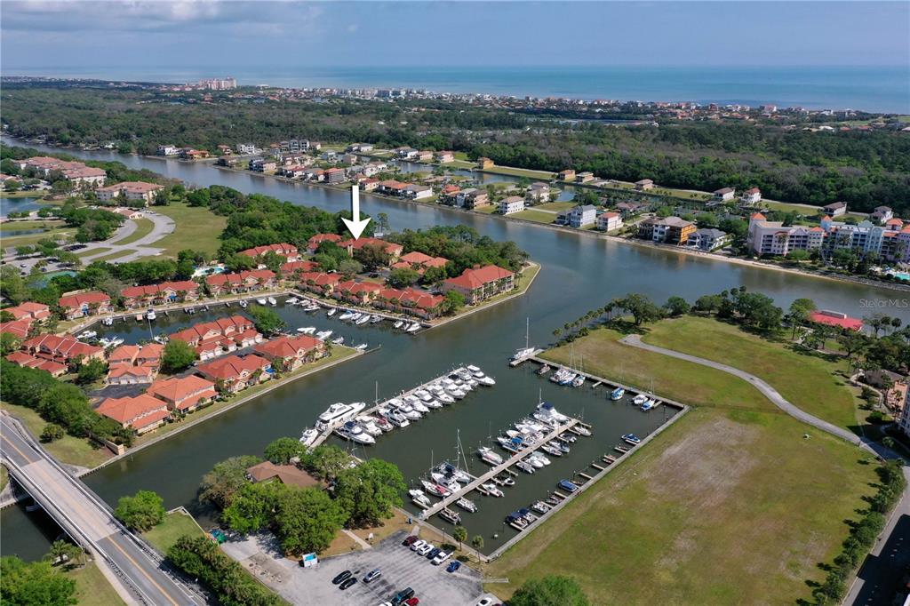 102 Rivers Edge Lane, Unit 102 Palm Coast, FL 32137 - Photo 49 of 67 an aerial view of a houses and an outdoor space