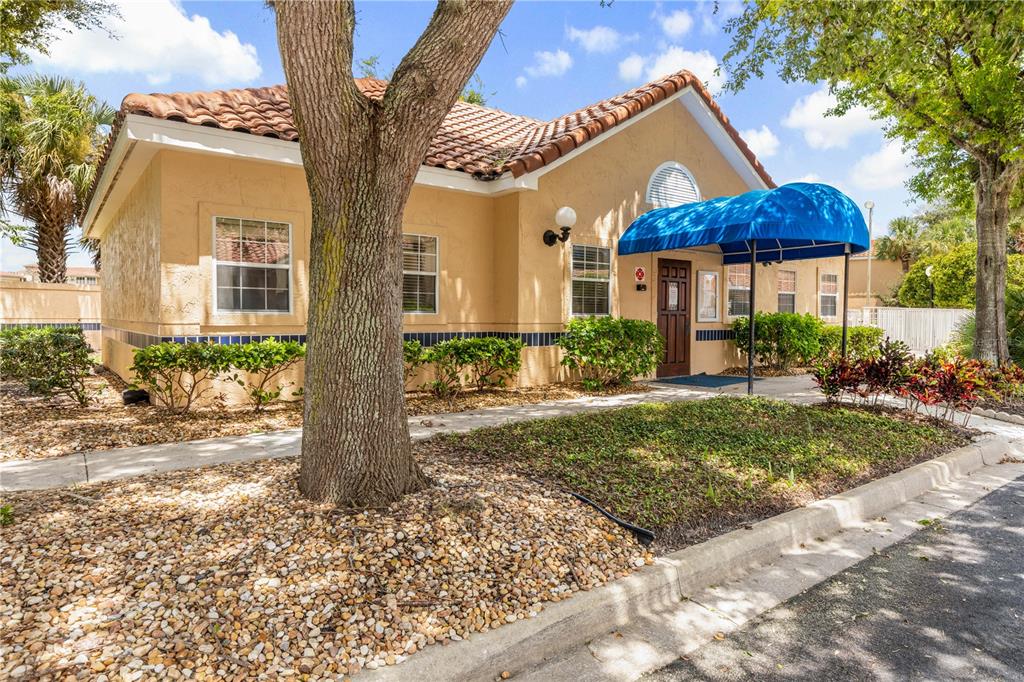 102 Rivers Edge Lane, Unit 102 Palm Coast, FL 32137 - Photo 53 of 67 a front view of a house with garden