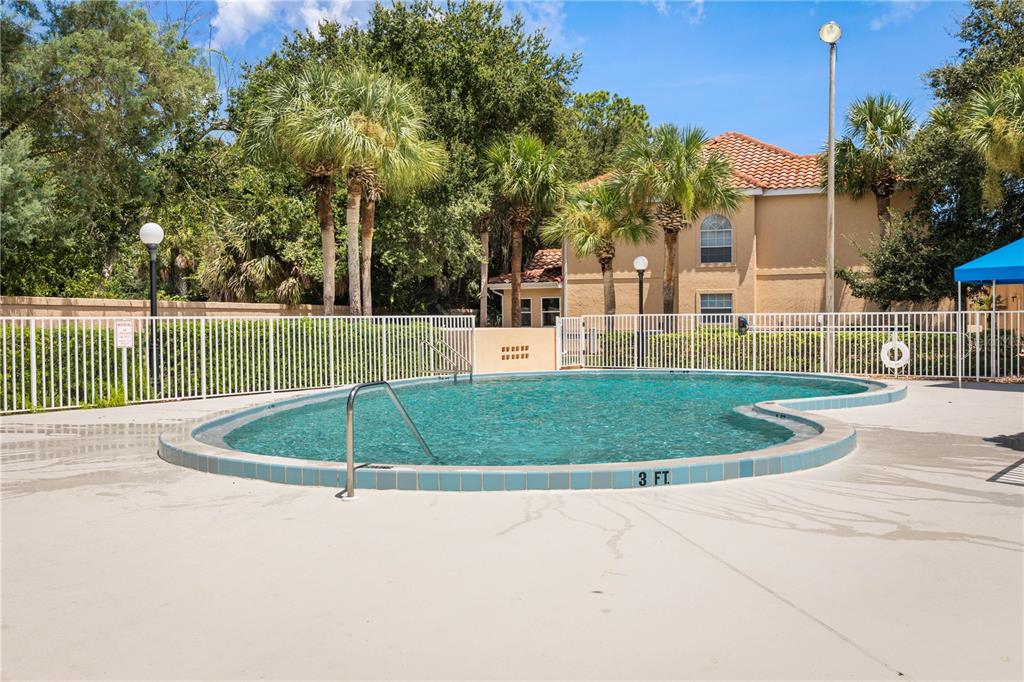 102 Rivers Edge Lane, Unit 102 Palm Coast, FL 32137 - Photo 55 of 67 a view of a backyard