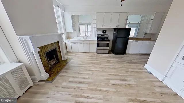 a view of a room with an entryway