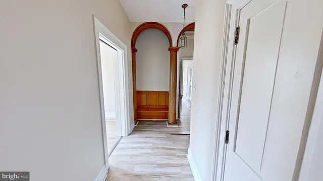 a view of wooden floor in an empty room