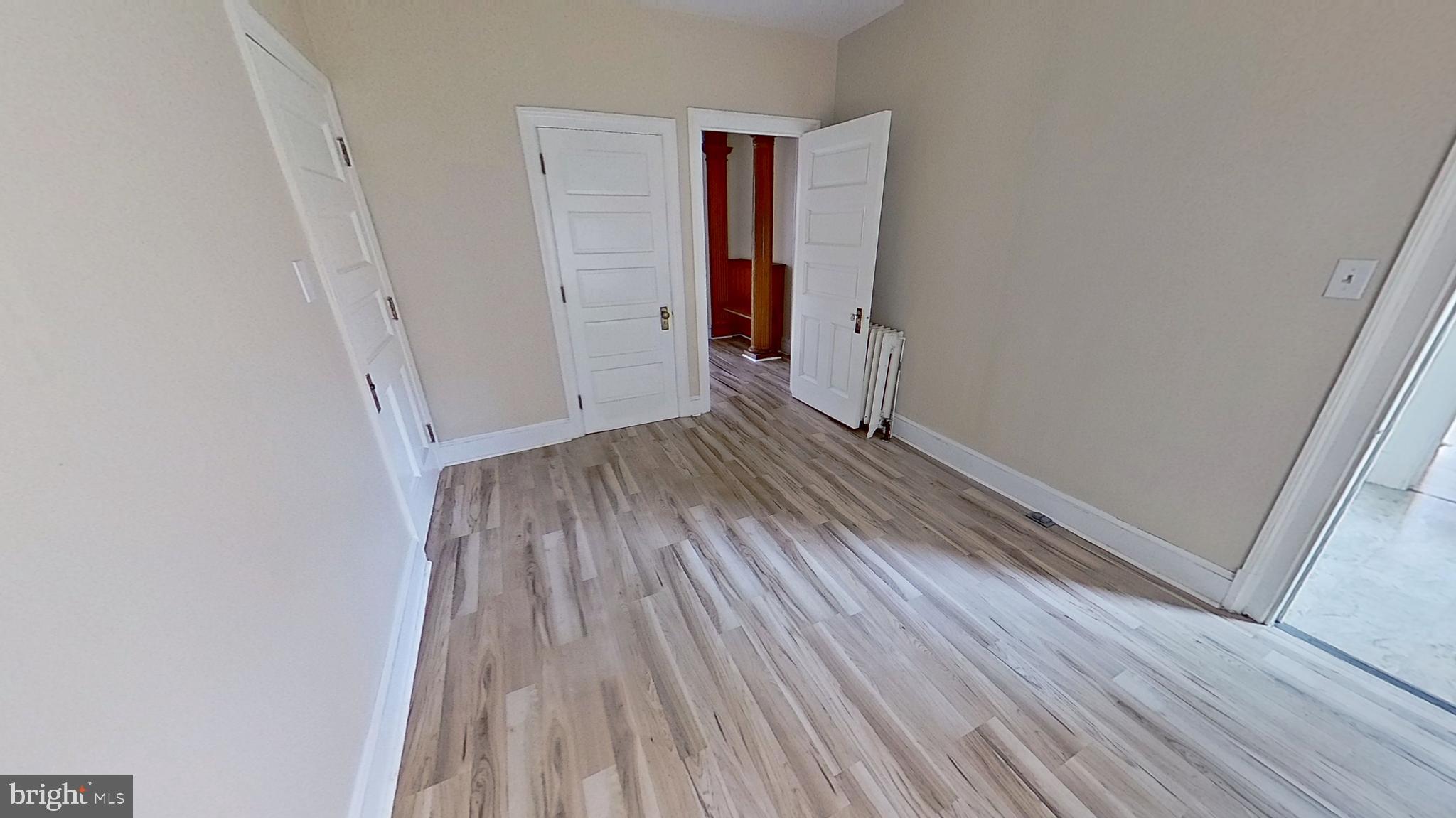 200 Carlisle Street, Unit A Hanover, PA 17331 - Photo 10 of 14 a view of wooden floor in an empty room