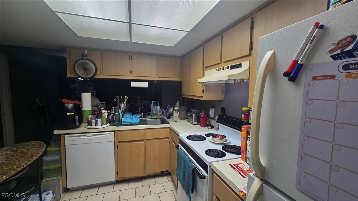 606 Gerald Avenue, Unit 112 Lehigh Acres, FL 33936 - Photo 7 of 17 a room with storage and utility