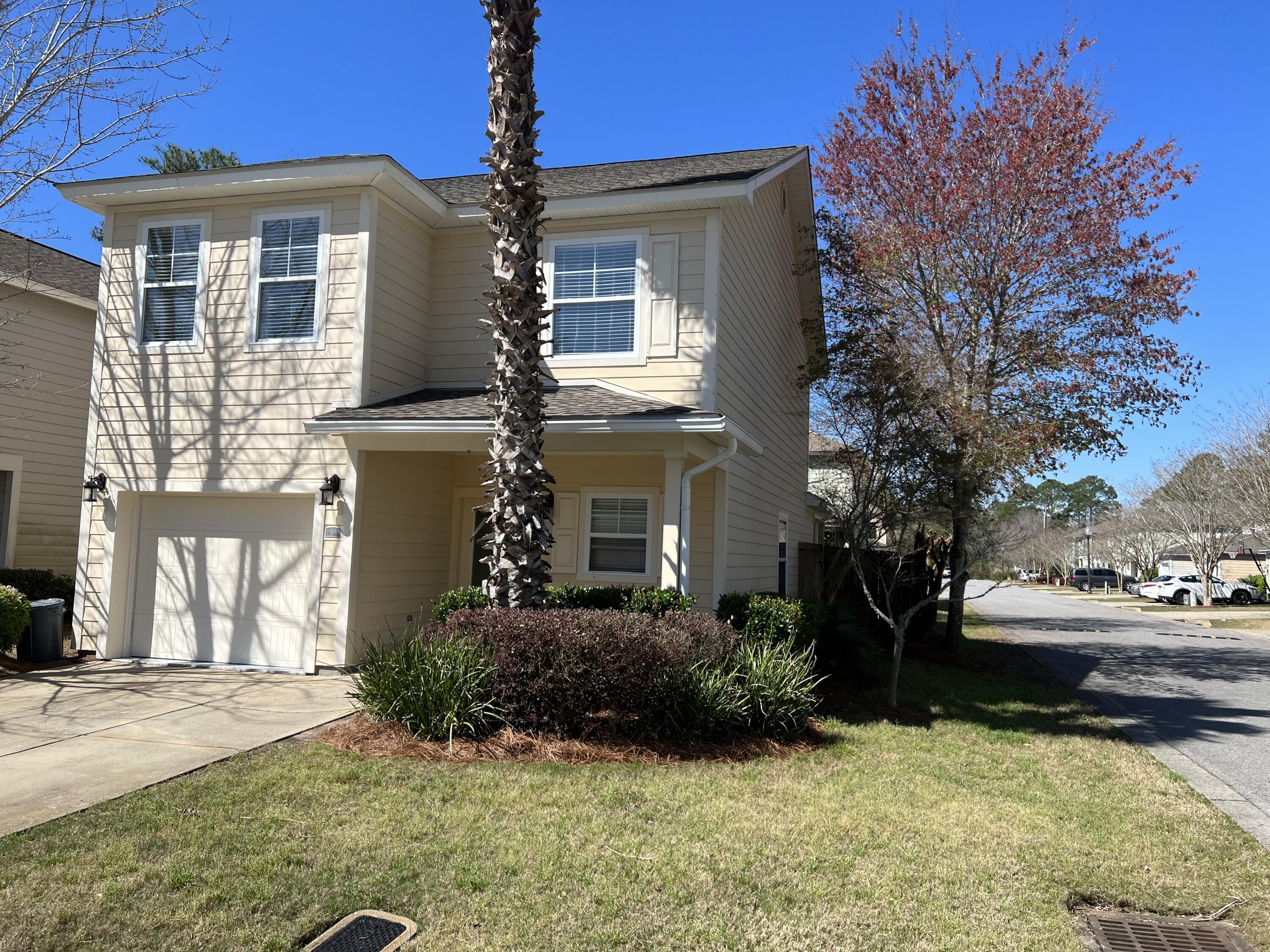 8 Myrtle Oak Way Santa Rosa Beach, FL 32459 - Photo 28 of 29 a front view of a house with a yard