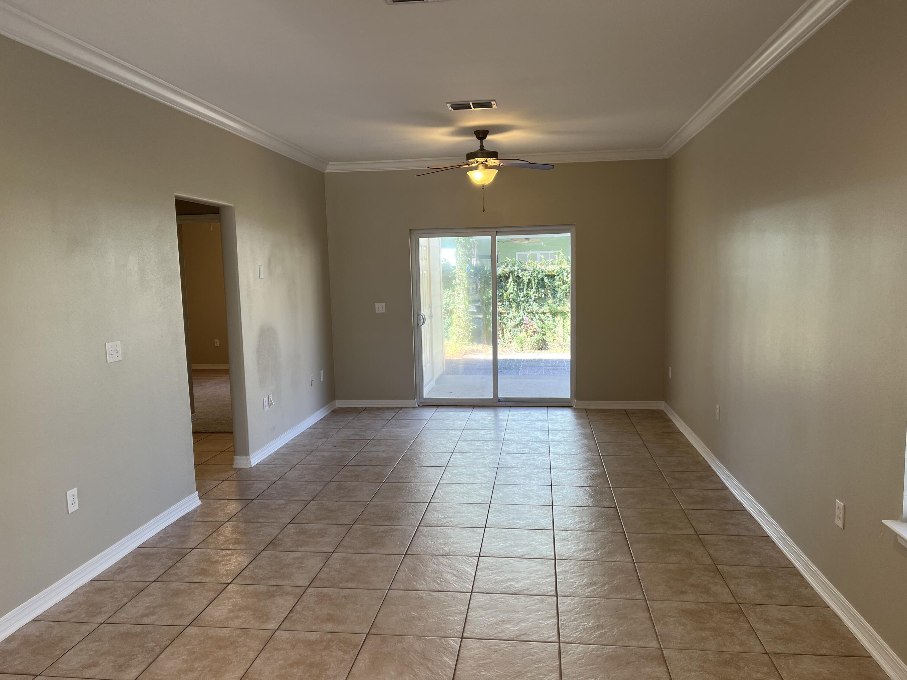 8 Myrtle Oak Way Santa Rosa Beach, FL 32459 - Photo 6 of 29 a view of an empty room with a window