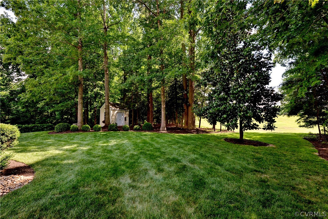 3523 Splitwood Road Toano, VA 23168 - Photo 40 of 41 View of yard with a shed