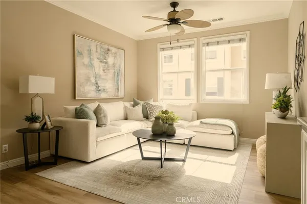 a living room with furniture and a window