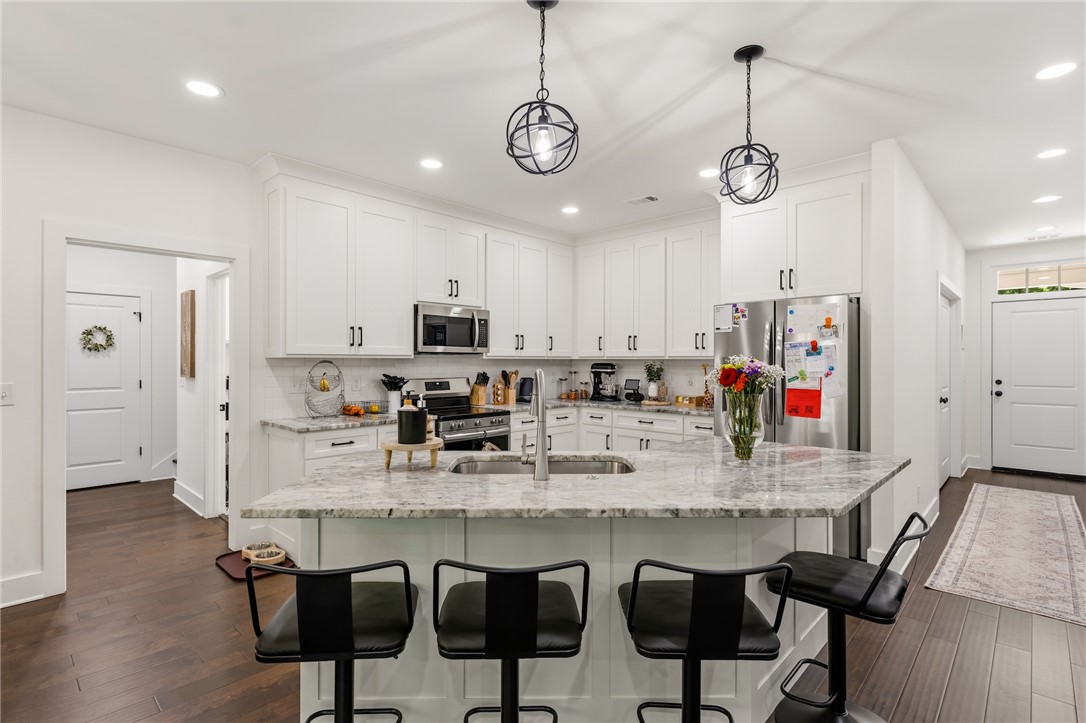 502 Canebrake Drive Anderson, SC 29621 - Photo 12 of 39 This bright kitchen features ample counter space and modern appliances, perfect for everyday living.