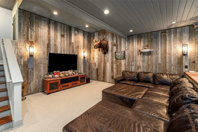 a room with furniture and a flat screen tv