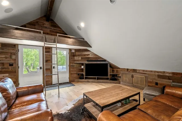 a large kitchen with kitchen island a sink stove and refrigerator