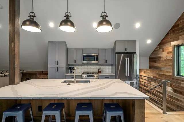 a view of backyard with seating area and green space