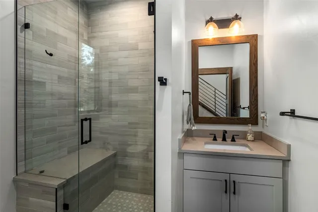 a kitchen with a sink cabinets and window