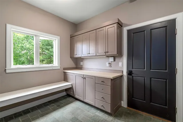 a view of a lake with a yard