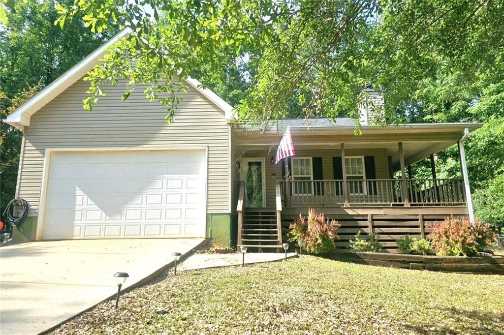 63 Ridgewood Road Jefferson, GA 30549 - Photo 1 of 1 a view of house with backyard