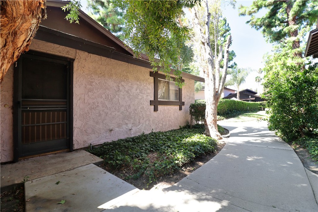 7554 Corbin Avenue, Unit 1 Reseda, CA 91335 - Photo 5 of 10 a view of a back yard of the house