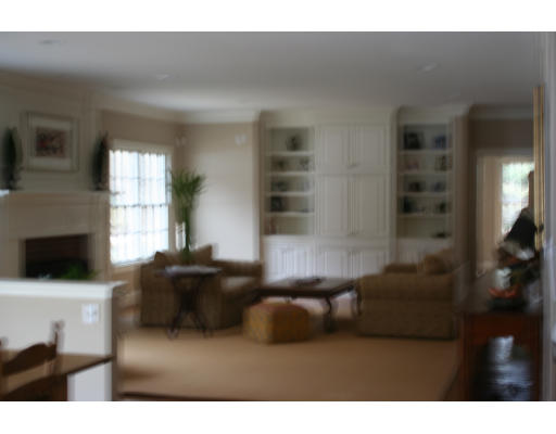 33 Wareland Road Wellesley, MA 02481 - Photo 2 of 7 a living room with furniture and a flat screen tv