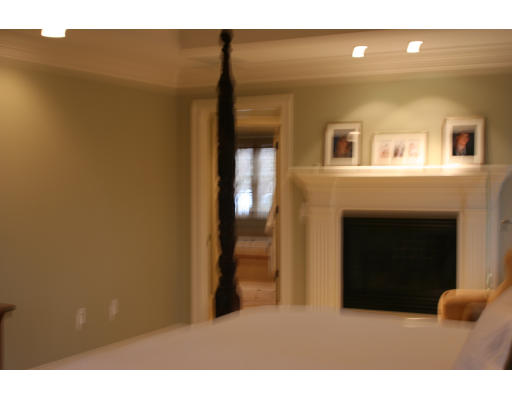 33 Wareland Road Wellesley, MA 02481 - Photo 6 of 7 a living room with furniture and a fireplace