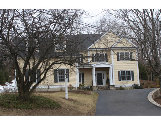 33 Wareland Road Wellesley, MA 02481 - Photo 7 of 7 a front view of a house with yard