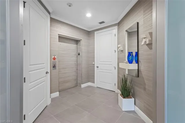 a en suite bathroom with a sink and a mirror
