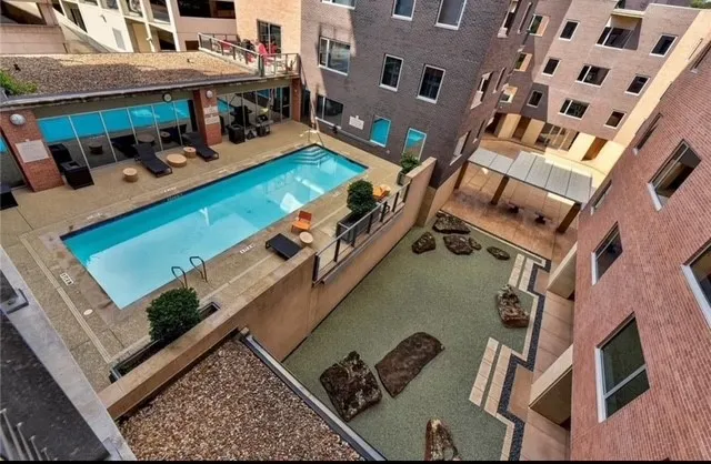 a view of an buildings with sitting area