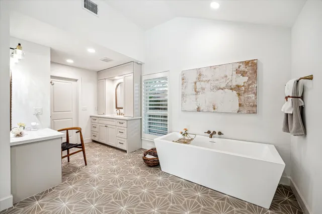 a bathroom with a sink and a shower