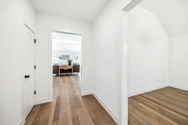 a kitchen with a stove and a chandelier