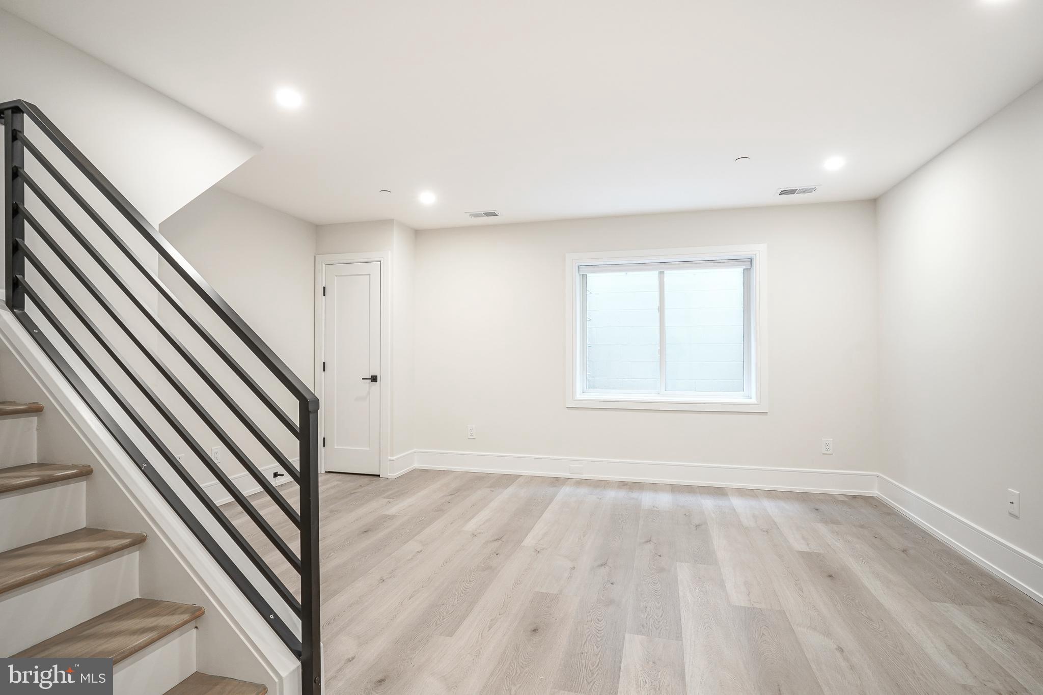 2002 Renaissance Walk, Unit 2 Philadelphia, PA 19145 - Photo 5 of 66 Large window, lower level, gym, work, playroom, ++