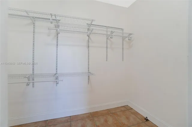 a view of an empty walk in closet