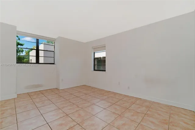 a view of an empty room and window
