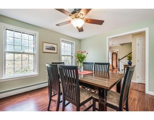 67 Wildwood Road Stow, MA 01775 - Photo 12 of 30 a view of a dining room with furniture window and wooden floor