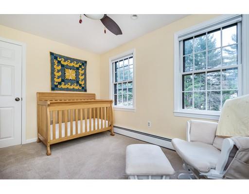 67 Wildwood Road Stow, MA 01775 - Photo 22 of 30 a bedroom with furniture and a large window
