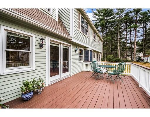 67 Wildwood Road Stow, MA 01775 - Photo 25 of 30 a view of a house with a patio