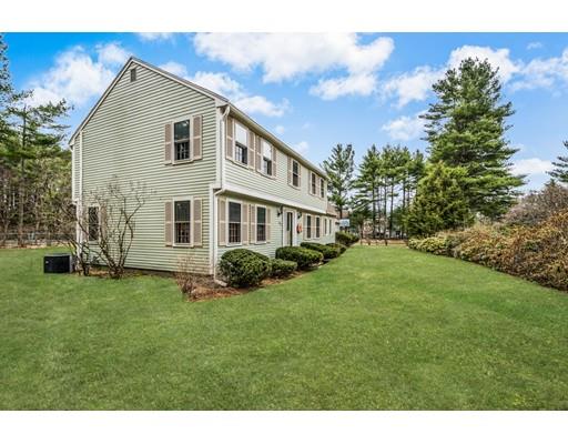67 Wildwood Road Stow, MA 01775 - Photo 30 of 30 a front view of a house with a yard
